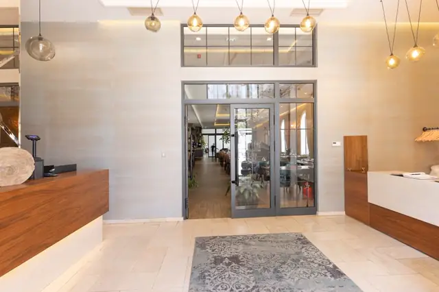 Tidy waiting area with comfortable seating in a commercial building lobby